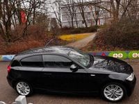 Używany BMW 118 Performance 143 KM (105 kW) 2011 Czarny Hatchback