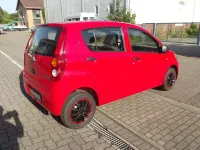 Gebraucht Daihatsu Cuore 69 PS (50 kW) 2008 Rot Kleinwagen