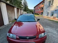 Gebraucht Mazda 323 88 PS (64 kW) 1997 Rot Kleinwagen