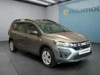 Gebraucht Dacia Jogger Essentiel 91 PS (66 kW) 2025 Grau Van / Kleinbus