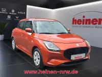 Neu Suzuki Swift Club 83 PS (61 kW) 2025 Orange Limousine