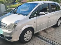 Używany Opel Meriva 105 KM (77 kW) 2009 Srebrny Minivan