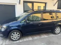 Używany VW Touran Match 105 KM (77 kW) 2012 Niebieski Minivan