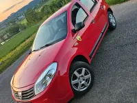 Używany Dacia Sandero 75 KM (55 kW) 2006 Czerwony Hatchback