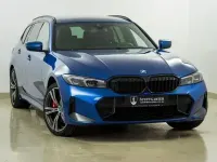Gebraucht BMW 330e M Sport 292 PS (214 kW) 2022 Portimao blau m Kombi