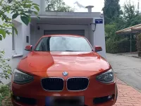 Gebraucht BMW 116 136 PS (100 kW) 2012 Orange Kleinwagen