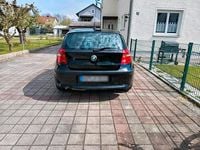 Second-hand BMW 116 122 CP (89 kW) 2010 Negru Hatchback