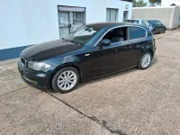 Używany BMW 116 Performance 122 KM (89 kW) 2010 Czarny Hatchback