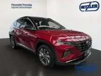 Gebraucht Hyundai Tucson Trend 150 PS (110 kW) 2021 Sunset red / phantom black / m SUV