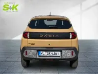Używany Dacia Spring Extreme 48 kW (66 KM) 2025 Beżowy Hatchback