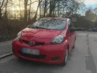 Gebraucht Toyota Aygo 68 PS (50 kW) 2009 Rot Kleinwagen