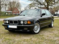 Second-hand BMW 740L 286 CP (210 kW) 1993 Negru Berlinǎ