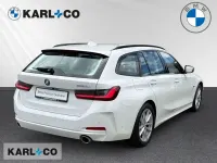 Gebraucht BMW 320e Shadowline 204 PS (150 kW) 2023 Weiss Kombi