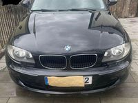 Gebraucht BMW 116 122 PS (89 kW) 2010 Schwarz Kleinwagen