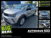 Gebraucht Opel Mokka 131 PS (96 kW) 2023 Kontrast grau/quarz silber SUV