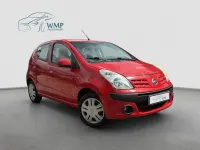 Gebraucht Nissan Pixo Acenta 68 PS (50 kW) 2012 Bright red (s) Kleinwagen