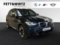 Gebraucht BMW iX3 Impressive 210 kW (286 PS) 2023 Carbonschwarz metallic SUV