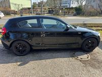 Gebraucht BMW 116 122 PS (89 kW) 2010 Schwarz Kleinwagen