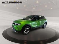 Gebraucht Opel Mokka Elegance 136 PS (100 kW) 2023 Matcha green SUV