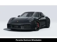 Gebraucht Porsche 992 541 PS (397 kW) 2024 Tiefschwarzmetallic Coupé