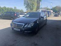 Second-hand Mercedes E200 184 CP (135 kW) 2011 Negru Berlinǎ