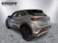 Gebraucht Opel Mokka Ultimate 131 PS (96 kW) 2022 Kontrast grau/quarz silber SUV