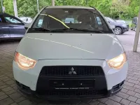 Gebraucht Mitsubishi Colt Inform 95 PS (69 kW) 2009 Silber Kleinwagen