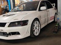 Second-hand Mitsubishi Lancer Evolution 280 CP (205 kW) 2001 Alb Berlinǎ
