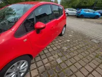 Używany Opel Meriva Selection 131 KM (96 kW) 2014 Czerwony Minivan