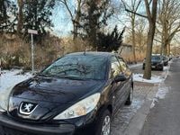 Gebraucht Peugeot 206+ 74 PS (54 kW) 2011 Schwarz Kleinwagen