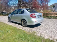 Second-hand Suzuki SX4 120 CP (88 kW) 2012 Argintiu Berlinǎ