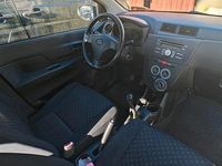 Gebraucht Daihatsu Cuore 70 PS (51 kW) 2010 Schwarz Kleinwagen