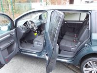 Gebraucht VW Touran Cup 105 PS (77 kW) 2014 Grün Van / Kleinbus