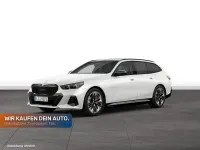 Gebraucht BMW 550e Comfort Edition 489 PS (359 kW) 2025 Mineralweiß metallic Kombi