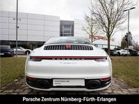 Gebraucht Porsche 992 450 PS (330 kW) 2020 Carraraweißmetallic Coupé