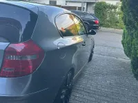 Second-hand BMW 116 Performance 122 CP (89 kW) 2009 Gri Hatchback