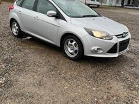 Second-hand Ford Focus 125 CP (91 kW) 2012 Argintiu Berlinǎ