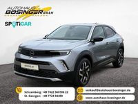 Gebraucht Opel Mokka-e Elegance 100 kW (136 PS) 2022 Kontrast grau/quarz silber SUV