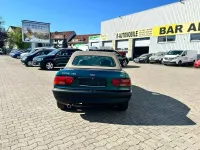 Gebraucht Ford Escort Cabriolet 116 PS (85 kW) 1995 Grün metallic Cabrio