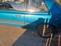 Second-hand Mazda 323 88 CP (64 kW) 1994 Albastru Hatchback
