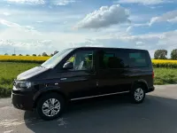 Używany VW Multivan 114 KM (83 kW) 2013 Purpurowy Minivan