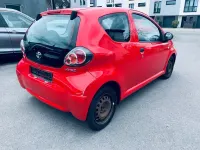 Gebraucht Toyota Aygo 68 PS (50 kW) 2009 Rot Kleinwagen