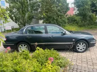 Gebraucht Kia Opirus 203 PS (149 kW) 2006 Schwarz Limousine