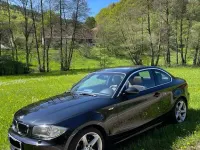 Second-hand BMW 123 Performance 204 CP (150 kW) 2009 Negru Hatchback