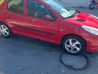 Gebraucht Peugeot 206+ 75 PS (55 kW) 2009 Rot Kleinwagen