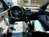 Używany Ford Escort 60 KM (44 kW) 1992 Srebrny Sedan/Limuzyna