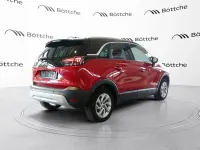 Gebraucht Opel Crossland Ultimate 131 PS (96 kW) 2024 Lackierung peperoncino red/met SUV