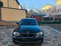 Usata BMW 116 122 CV (89 kW) 2009 Nero Utilitaria