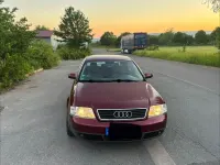 Używany Audi A6 150 KM (110 kW) 1999 Czerwony Sedan/Limuzyna