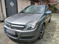 Używany Opel Astra 75 KM (55 kW) 2004 Purpurowy Kombi